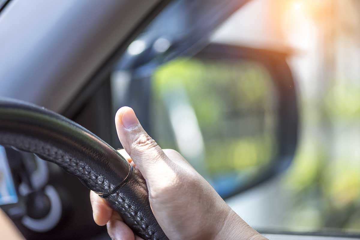 Close Up Hand Driving Car With Side Mirror Background Safety Driving Concept Close Up Hand Driving Car With Side Mirror Background Safety Driving Concept