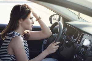 Stressed Woman Driver Sitting Inside Her Car